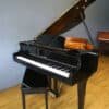 Wurlitzer Petite Baby Grand Piano Model C143 in a room.