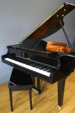 Wurlitzer Petite Baby Grand Piano Model C143 in a room.